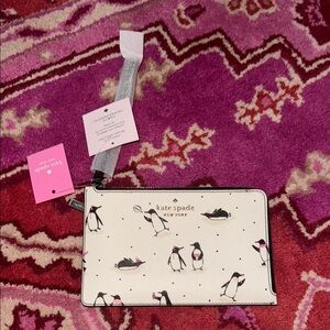NWT Kate Spade White and Black Penguin Wristlet
